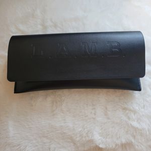 L.A.M.B. by Gwen Stefani black glasses case with magnetic closure